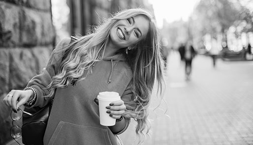 happy-woman-with-coffee_514x300